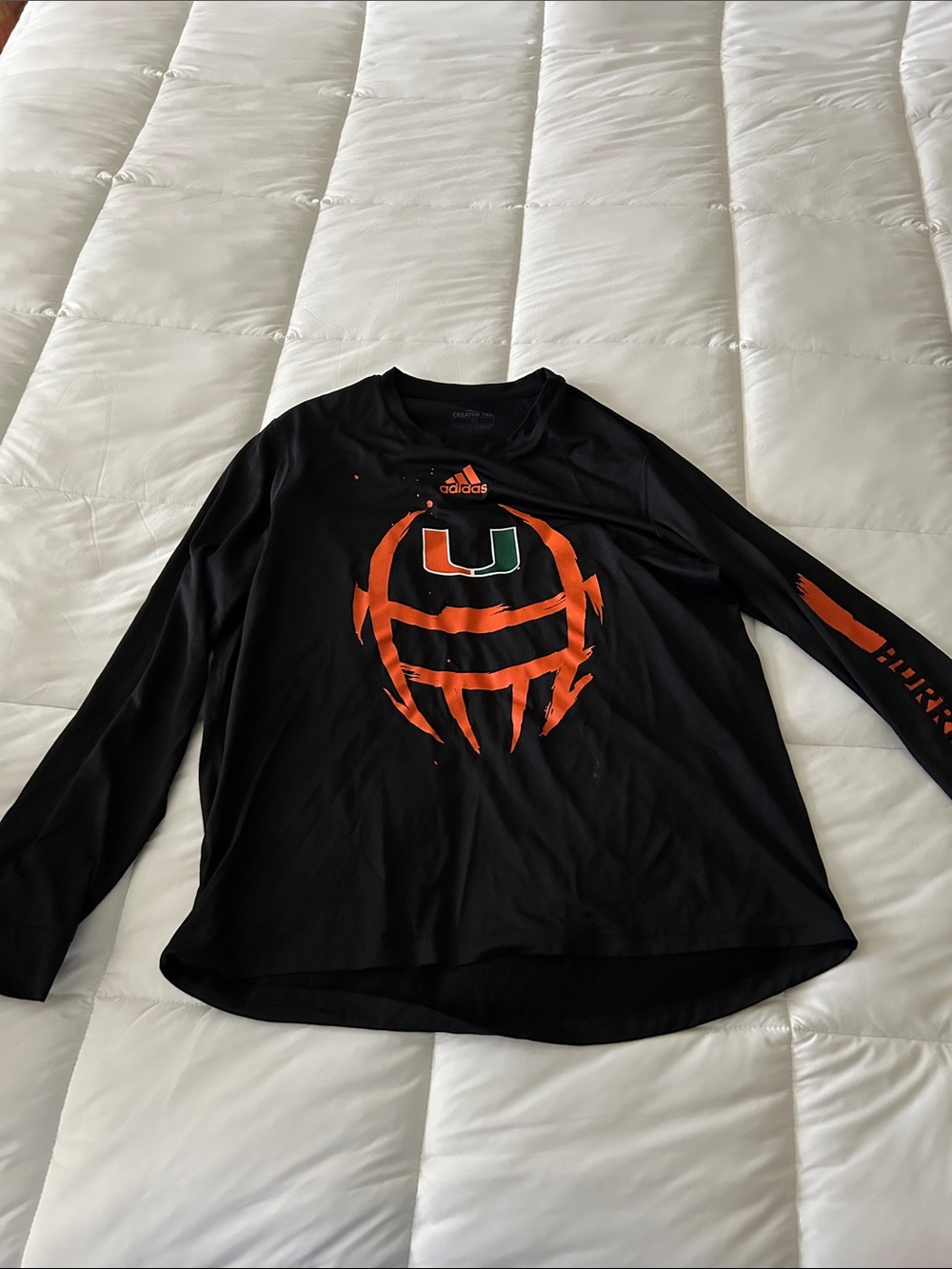Miami Hurricanes adidas Black Long Sleeve Tee with Orange Miami U Graphic
